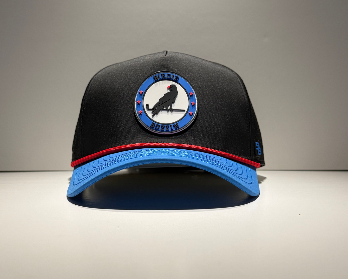 "THE TEE" • 5 PANEL W/ROPE • SNAPBACK • BLACK/BLUE/RED