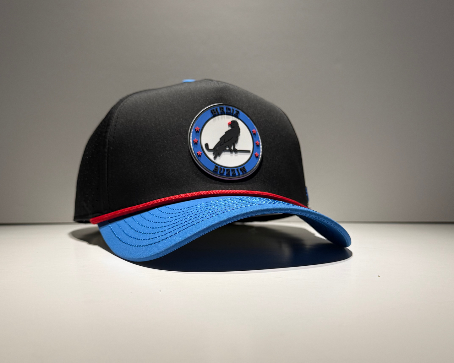 "THE TEE" • 5 PANEL W/ROPE • SNAPBACK • BLACK/BLUE/RED